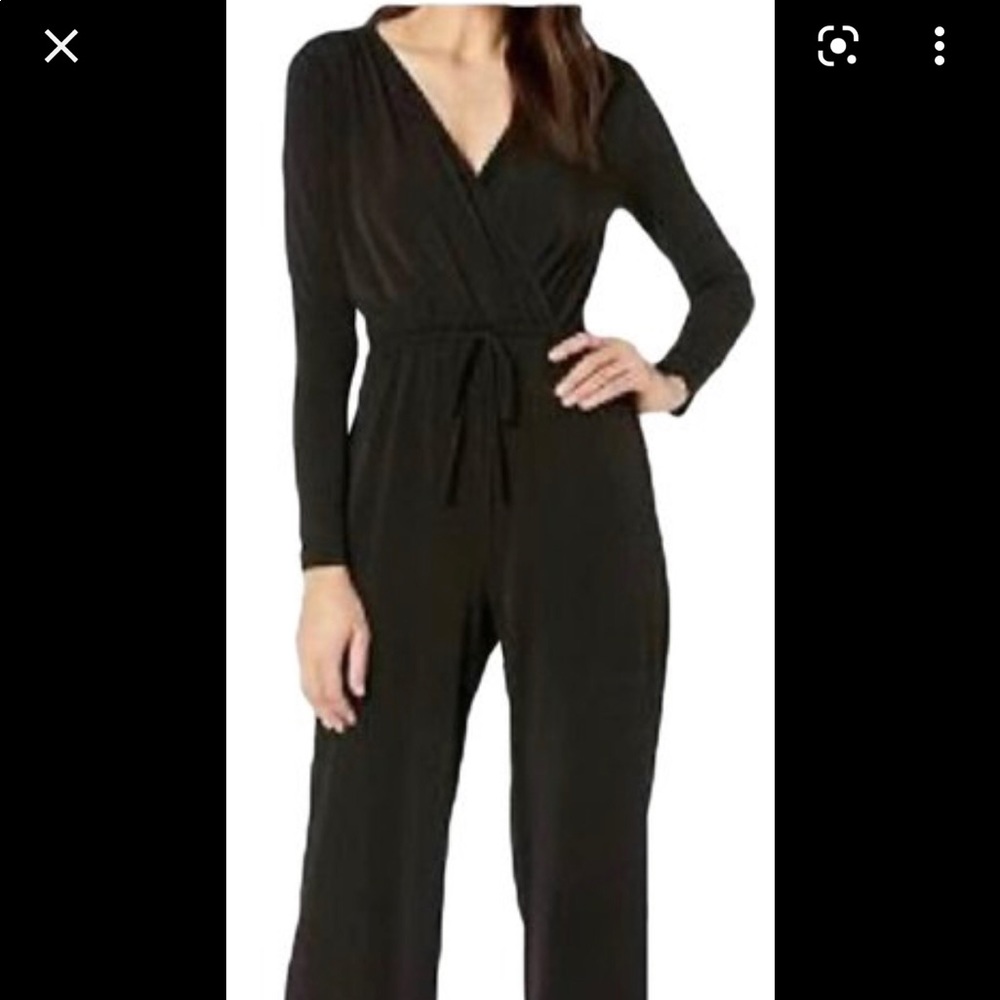 BCBGeneration Open Back Black Jumpsuit size S